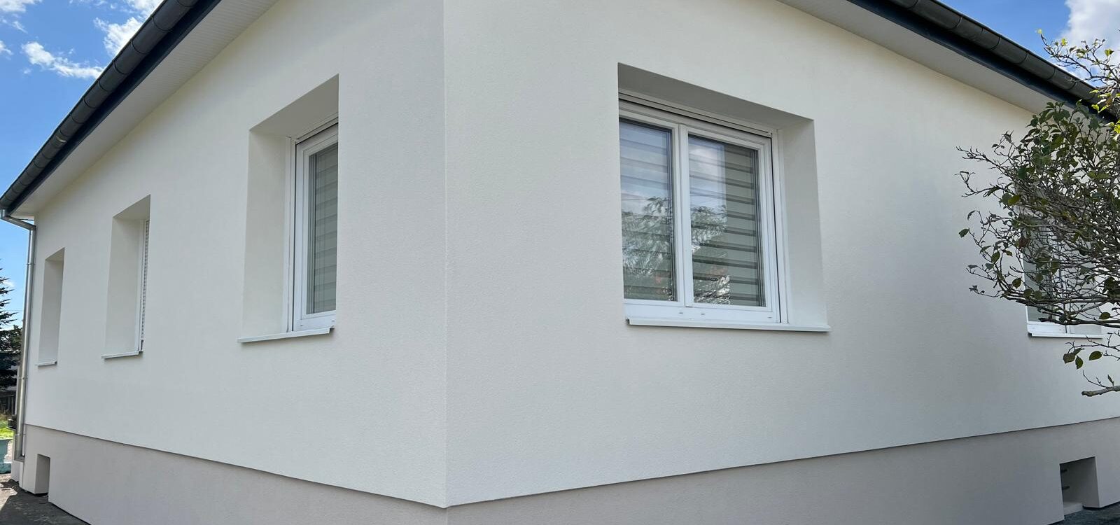 Travaux de ravalement de façades à Mulhouse : remise en état complète avec enduit de marouflage Illzach