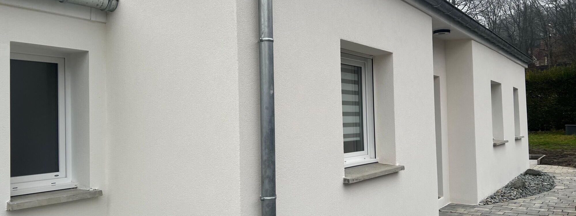 WHATSAPP IMAGE 2025 12 22 AT 15.01.09 2000X750 | Simsek Façades Ravalement de façade d’une maison individuelle à Dorans Audincourt